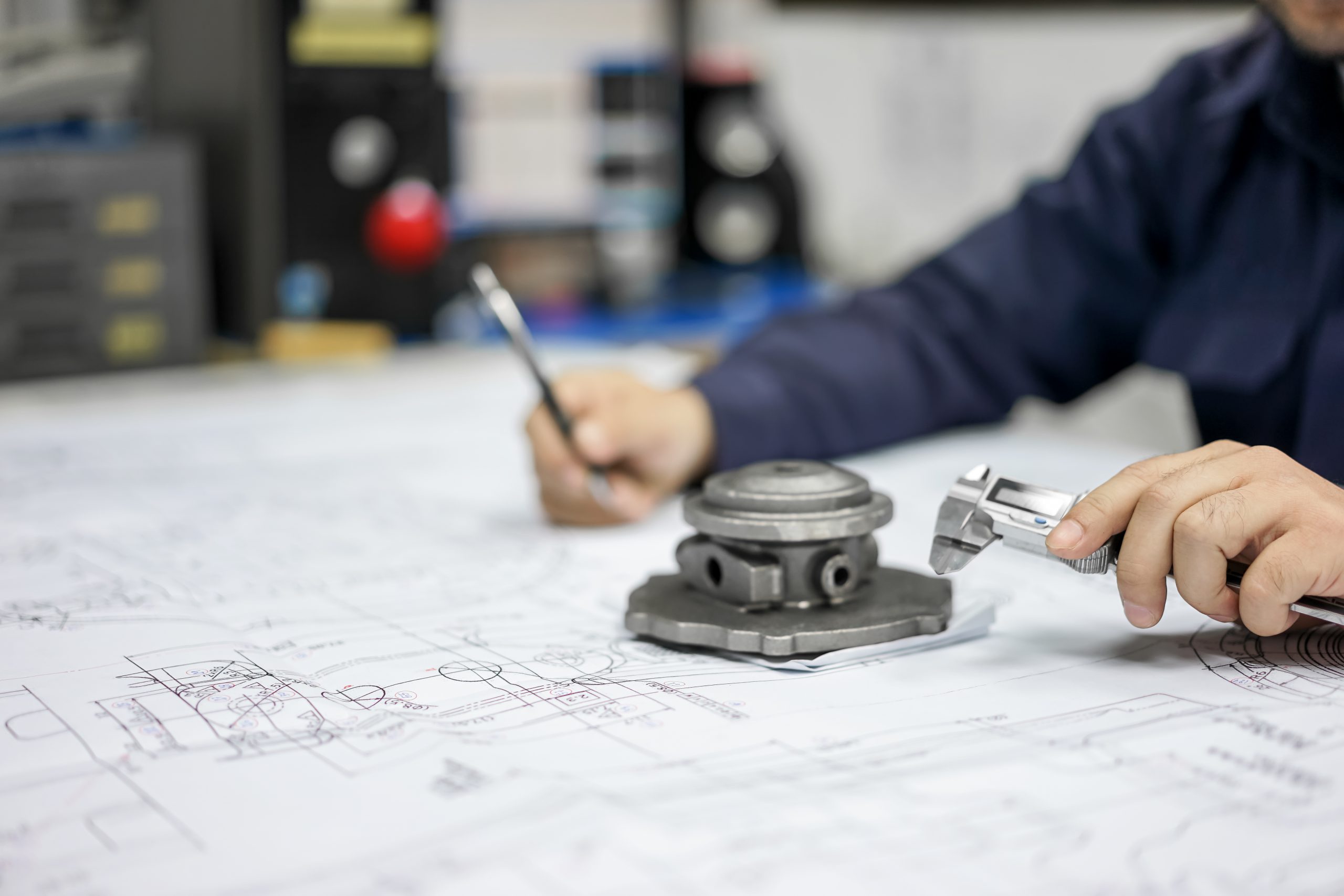 Engineering inspection check dimension automotive parts reference drawing by vernier caliper in industrial factory